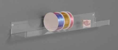 Clear acrylic multi-use shelf.