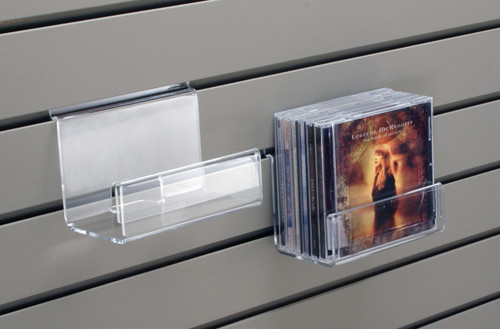 This clear acrylic small shelf is the perfect size for CDs, DVDs, or books and has a built in sign holder. The shelf is ready to hang on existing slatwall.