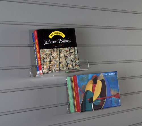 Clear acrylic single facing retail shelf with lip for slatwall.