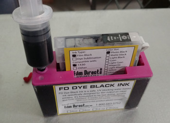 Load ink into the syringe. Easier to fill than from a bottle! Load ink into the syringe. Easier to fill than from a bottle!