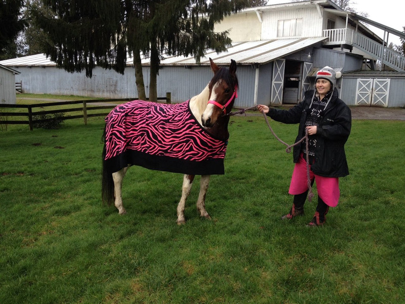 Flower modeling her new pink zebra cooler Pattern is available