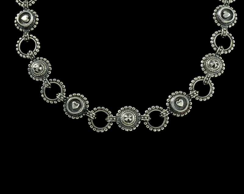 Handmade Sterling Silver Heart and Nail Head Necklace by Bowman Originals, Sarasota, 941-302-9594.