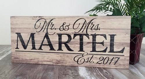 wooden family name sign