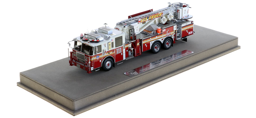 FDNY Tower Ladder 111 includes a fully custom display case.