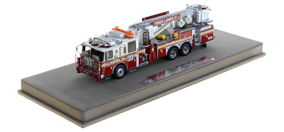 FDNY Tower Ladder 33 includes a fully custom display case.