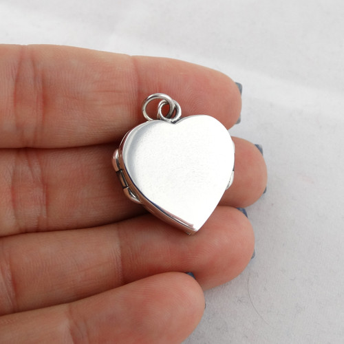 angel wings heart locket reo company
