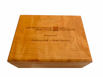 Our Personalized Boxes are crafted in the United States from finely finished cherry wood. This personalized hinged-box is designed to hold a variety of items such as candy, jewelry, business cards, pens or golf balls. This interior of the box includes felt lining. Great for promotions, awards or recognition. Our Personalized Boxes are crafted in the United States from finely finished cherry wood. This personalized hinged-box is designed to hold a variety of items such as candy, jewelry, business cards, pens or golf balls. This interior of the box includes felt lining. Great for promotions, awards or recognition.