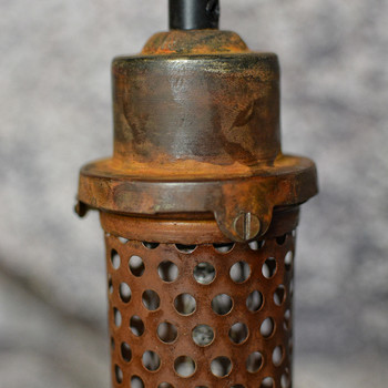 Rusted perforated Cage Rusted perforated Cage