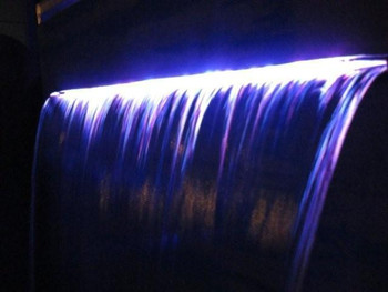 1200mm Wide Stainless Steel Spillway 316 Grade with Multi-Colour LED light bar. Suitable for Swimming pool or Free standing water feature projecting effect set up. 1200mm Wide Stainless Steel Spillway 316 Grade with Multi-Colour LED light bar. Suitable for Swimming pool or Free standing water feature projecting effect set up.