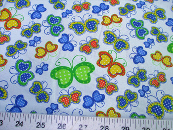 Discount Fabric Cotton Apparel Multi-Colo?red Butterflie?s on Light Blue 402K Discount Fabric Cotton Apparel Multi-Colo?red Butterflie?s on Light Blue 402K