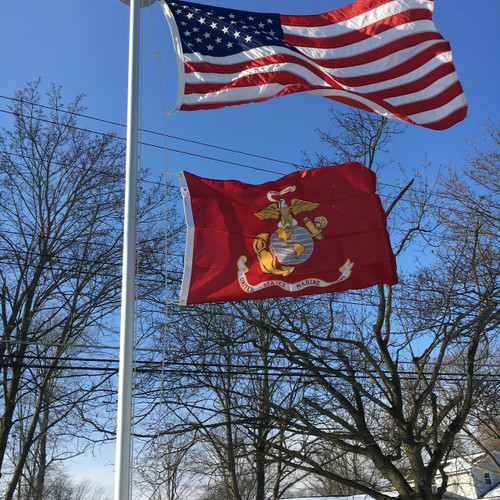 United States Marine Corps Flag flying proudly. 2'x3' under a 3'x5' American Flag on the 21' Classic Flag Pole. All 100% Made in the U.S.A. United States Marine Corps Flag flying proudly. 2'x3' under a 3'x5' American Flag on the 21' Classic Flag Pole. All 100% Made in the U.S.A.