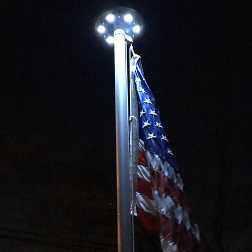 Titan Solar Disc Light-Shining bright on 3'x5' American Flag Made in USA Titan Solar Disc Light-Shining bright on 3'x5' American Flag Made in USA