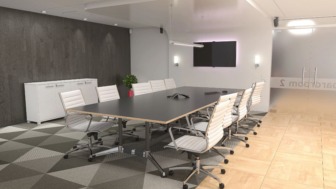Industrial Boardroom with a White Boardroom Table and Low Back Black Executive Chairs