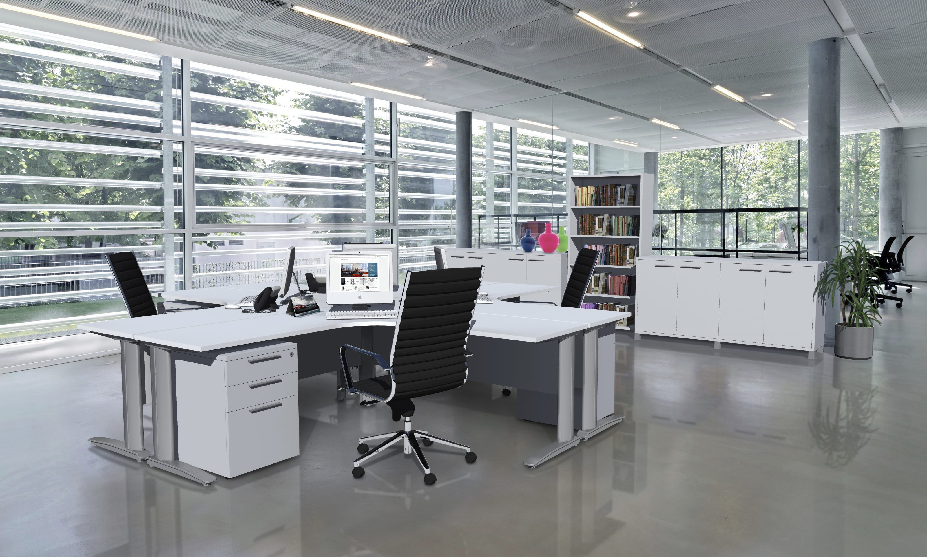 Private Office Space with a 4 Person Worksation and Black Executive Chairs