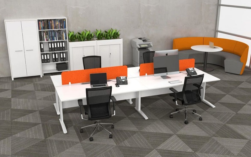 Minimalistic Open Plan Office with one 4 Person Workstations and Rounge Lounge Seating Minimalistic Open Plan Office with one 4 Person Workstations and Rounge Lounge Seating