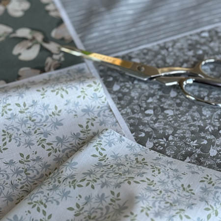 Cut fabric into individual fat quarter sections
