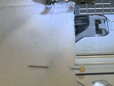 Pinning the fleece fabric around the edges