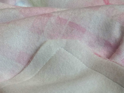Trimming corners of sewn fleece blanket