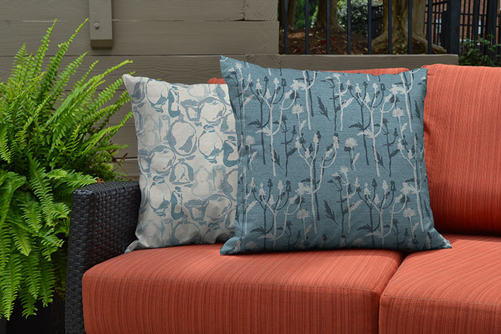 four pillows in blues and greys