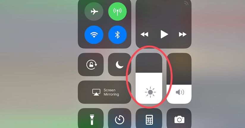 Adjusting brightness on iPhone device