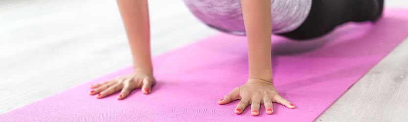 woman practicing yoga