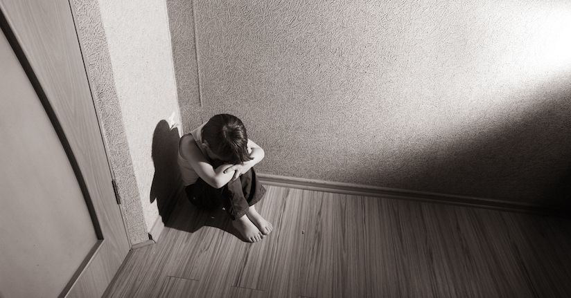 Young child with migraine light sensitivity