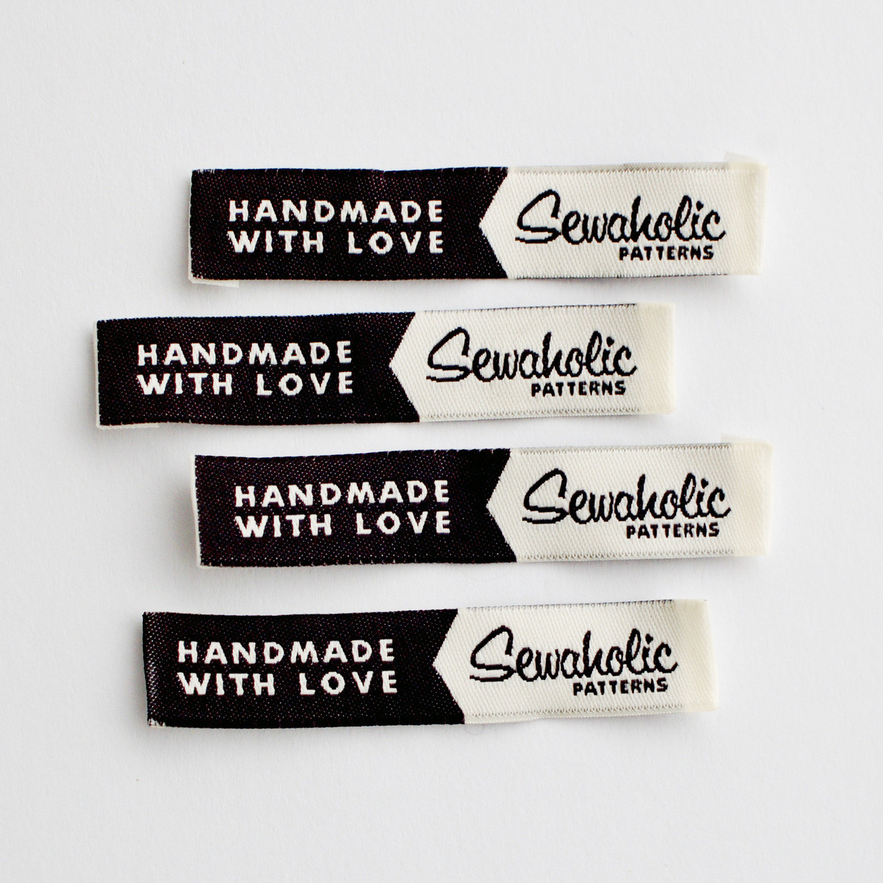 Handmade With Love sewin fabric label for clothing.
