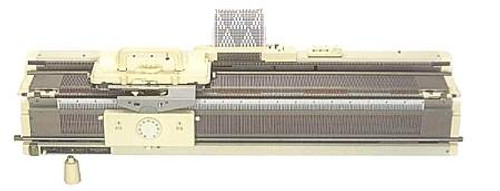this picture shows the ribber attached to the SK280 knitting machine. the bottom bed is the ribber. this picture shows the ribber attached to the SK280 knitting machine. the bottom bed is the ribber.