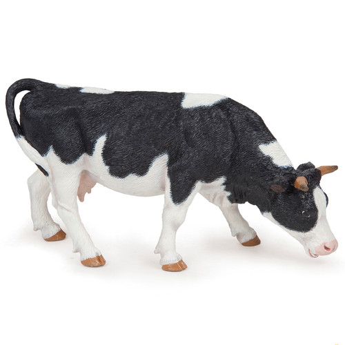 Black and White Cow Grazing Papo