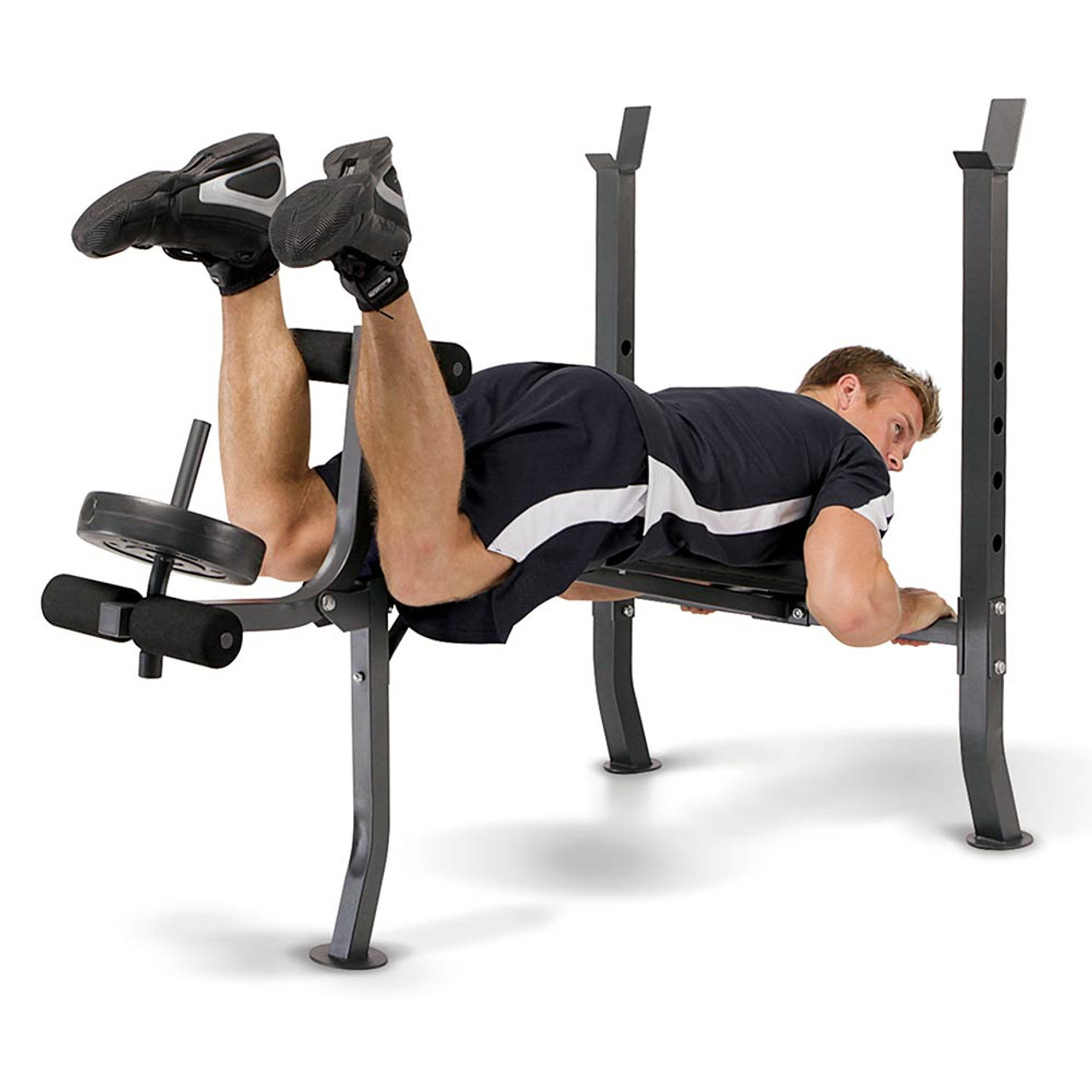 The Marcy Weight Bench 80lb Weight Set MD-2080 in use - leg curls