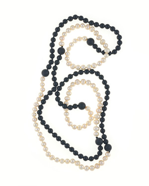 Copacabana Promenade I - Pearl Necklace Accented with Onyx, Single strand white freshwater pearls 7.5mm, transitioning to untumbled onyx beads 8mm, punctuated with 14mm untumbled onyx beads, on individually hand knotted natural silk