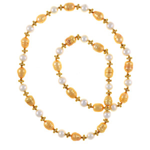 Leone d'Oro I Pearl Necklace: Single strand freshwater white 9mm and gold 10.5x13mm laser dyed gold pearls interspaced with finely detailed CZ and brass beads, 26” in length, opera to rope length
