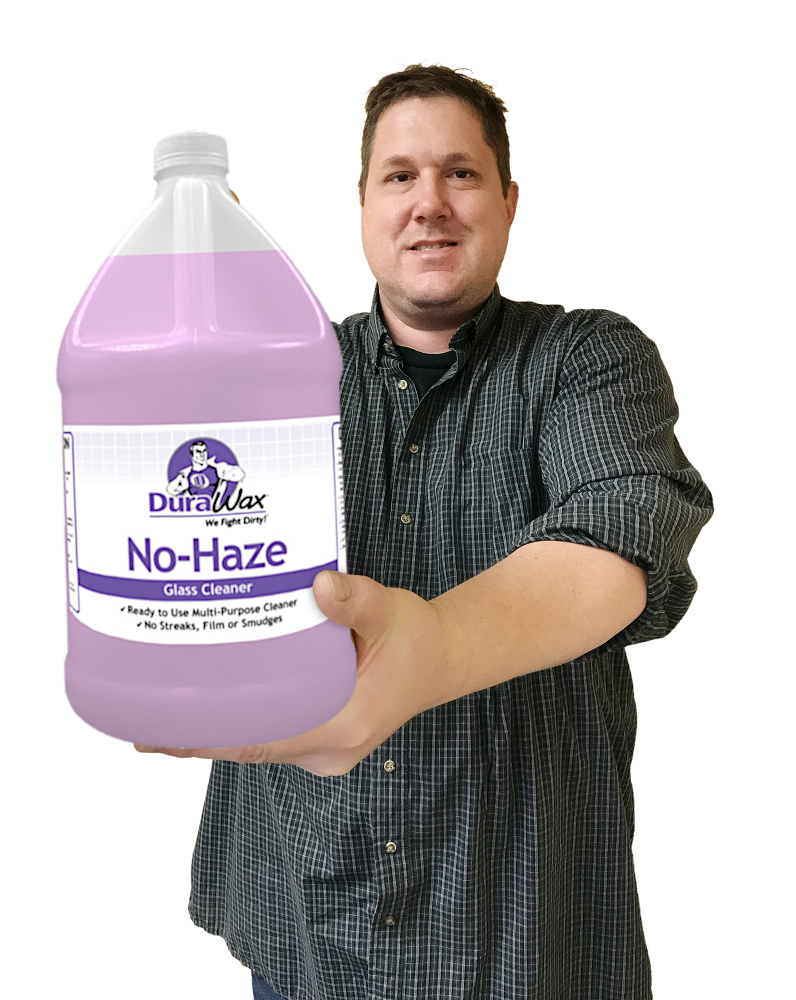 Dave holding no haze ready to use glass cleaner