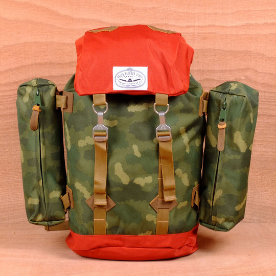 camo and orange backpack