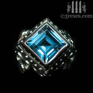womans gothic rings silver raven-love-ring-blue-topaz-stone-on-black