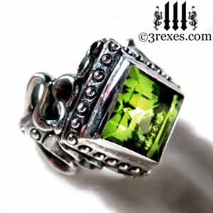 raven-love-silver-wedding-ring-gothic-green-peridot-stone-medieval-engagement-band August birthstone rings by 3 rexes jewelry