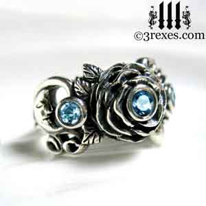 silver moon ring, silver rose ring, silver flower ring, with moon detail and blue topaz stones december birthstone by 3 rexes jewelry
