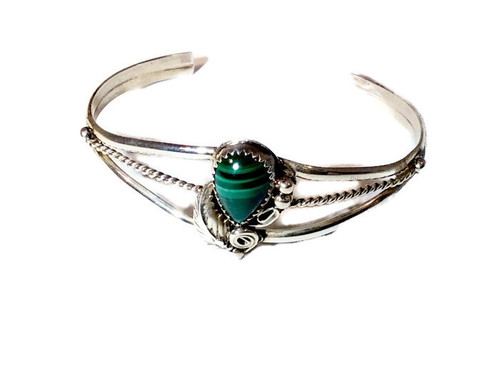 Floral Malachite Sterling Silver Cuff Bracelet
.925 Sterling Silver
Navajo Tribe Native American Jewelry
Handcrafted