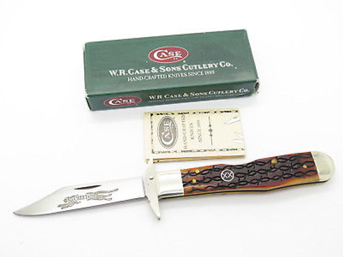 2002 CASE XX 6111 1/2 CHEETAH BARBED WIRE BONE SWING GUARD FOLDING KNIFE