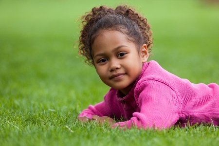 Beautiful biracial girl with curly hair